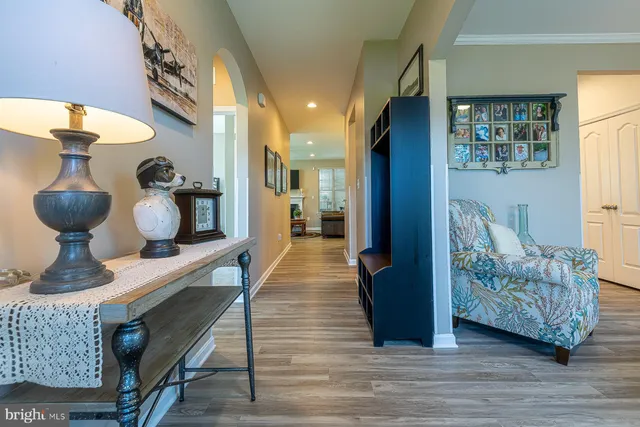 a room with furniture and wooden floor