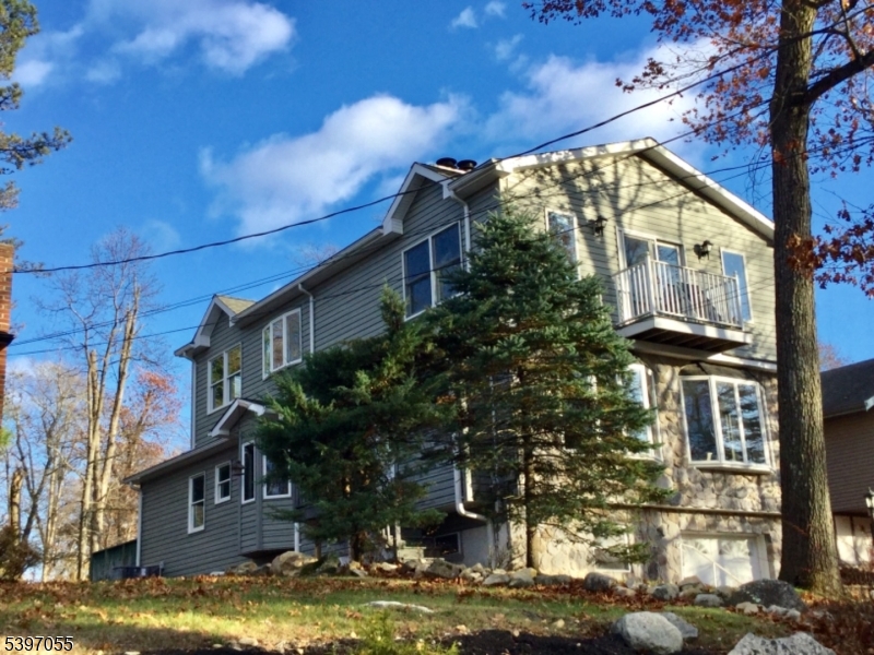 592 Dell Road Landing, NJ 07850 - Photo 2 of 39 a view of a house with a yard