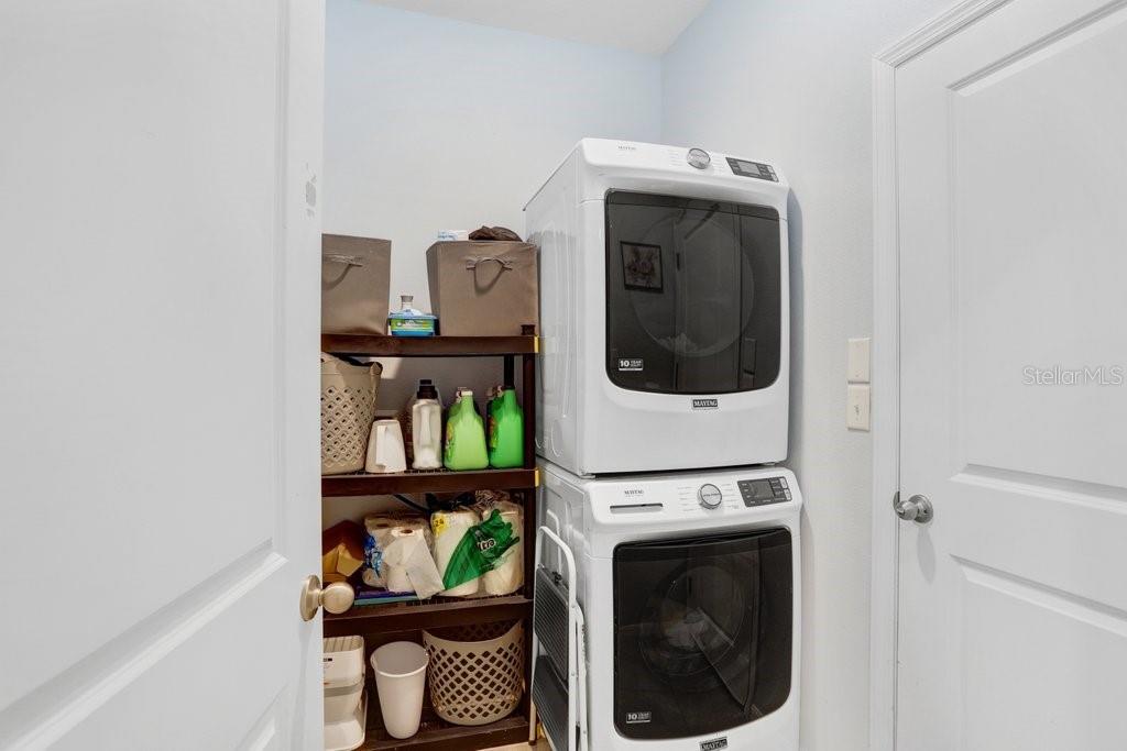 16619 Goose Ribbon Place Wimauma, FL 33598 - Photo 25 of 38 a utility room with dryer and washer