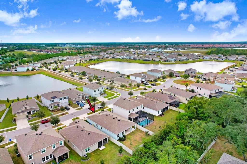 16619 Goose Ribbon Place Wimauma, FL 33598 - Photo 36 of 38 an aerial view of a city