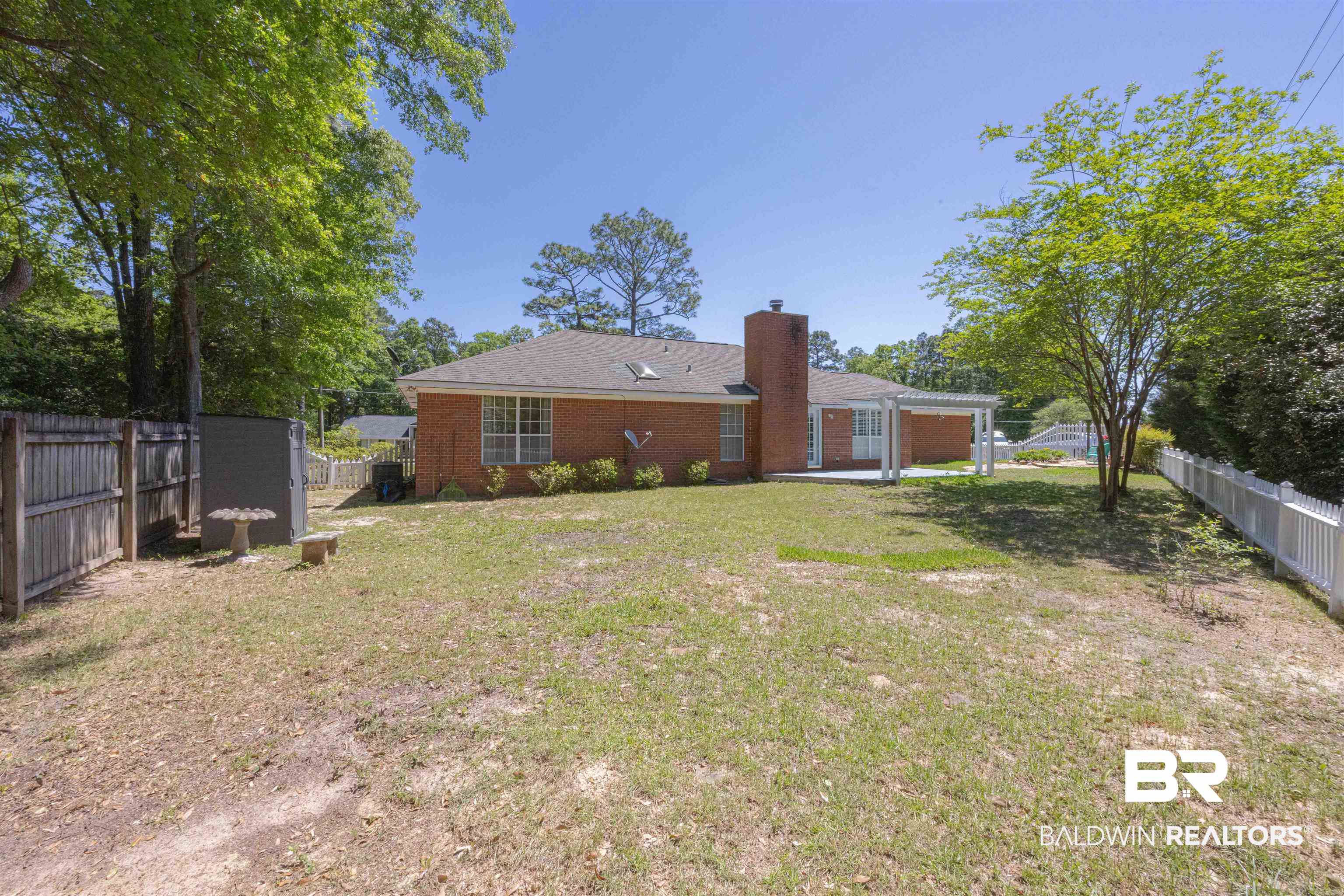 485 Ridgewood Drive Daphne, AL 36526 - Photo 38 of 38 View of yard with a patio area and a fenced backyard