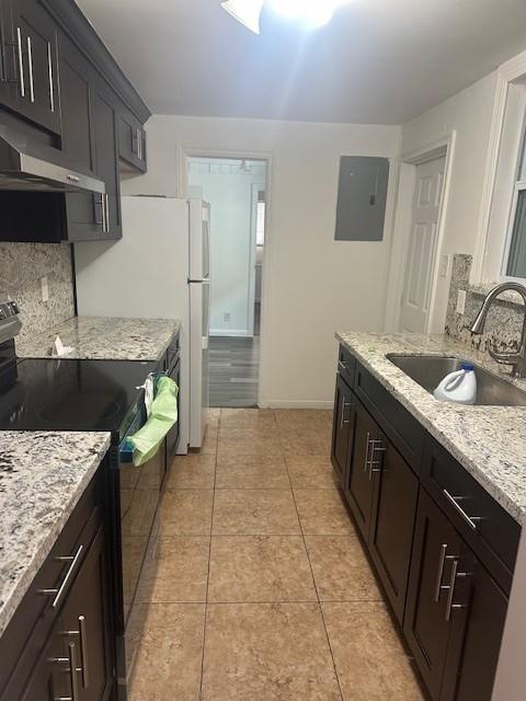 1141 Southeast 4th Avenue Fort Lauderdale, FL 33316 - Photo 13 of 25 a kitchen with stainless steel appliances granite countertop a sink stove and refrigerator