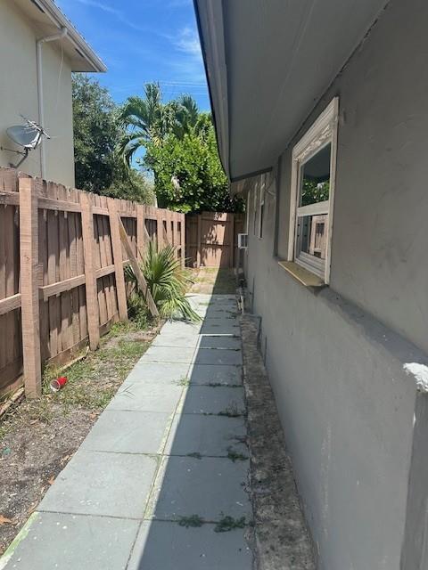 1141 Southeast 4th Avenue Fort Lauderdale, FL 33316 - Photo 5 of 25 a pathway of a house with a yard
