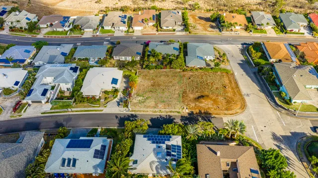 an aerial view of a house with a swimming pool