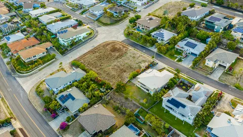 a view of a room with a wooden floor
