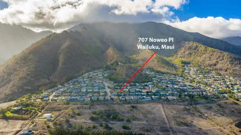 a view of a city with an ocean