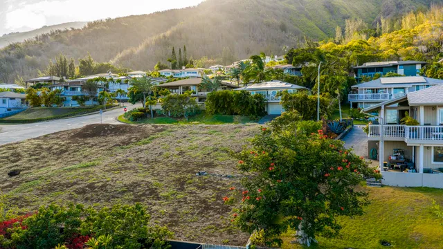 a view of multiple house with a yard