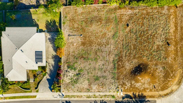 an aerial view of residential house with outdoor space