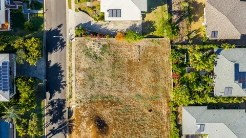 a view of a balcony with a lake view