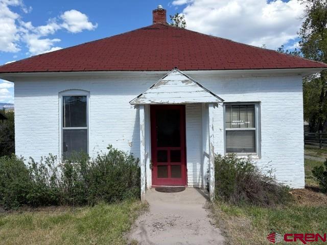 116 South Mary Street Ridgway, CO 81432 - Photo 2 of 23 a front view of a house with garden