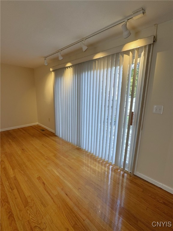 4307 Candlelight Lane Clay, NY 13090 - Photo 18 of 31 LR with vertical blinds