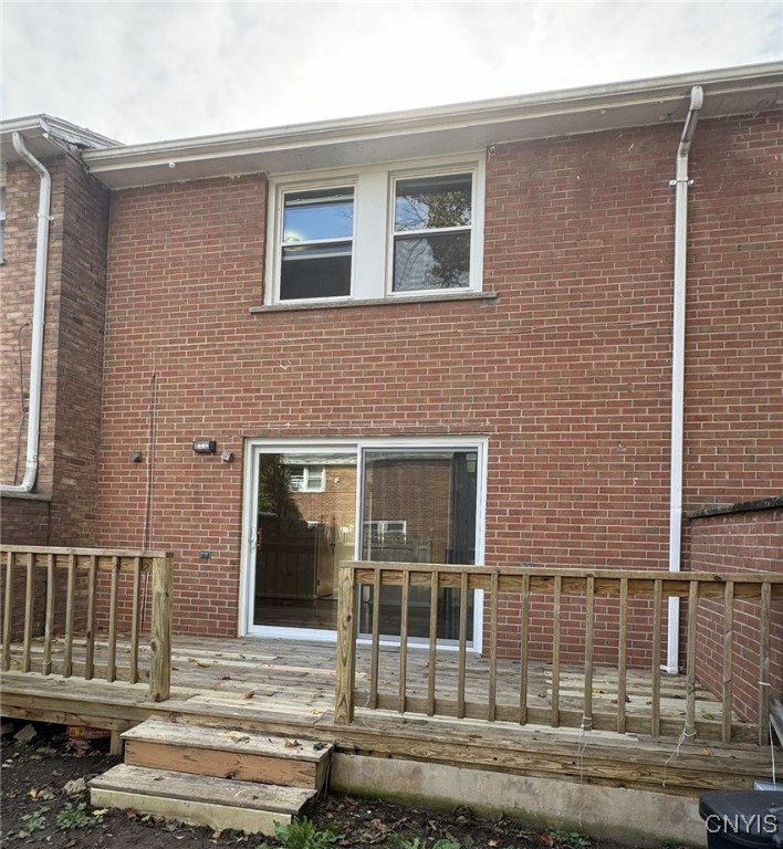 4307 Candlelight Lane Clay, NY 13090 - Photo 31 of 31 back of house with deck, full fenced yard