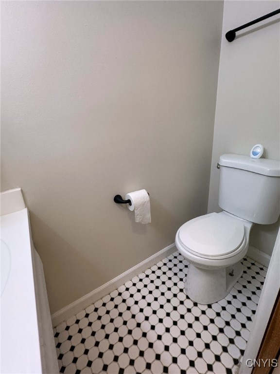 4307 Candlelight Lane Clay, NY 13090 - Photo 7 of 31 half bath vintage black/white tiles
