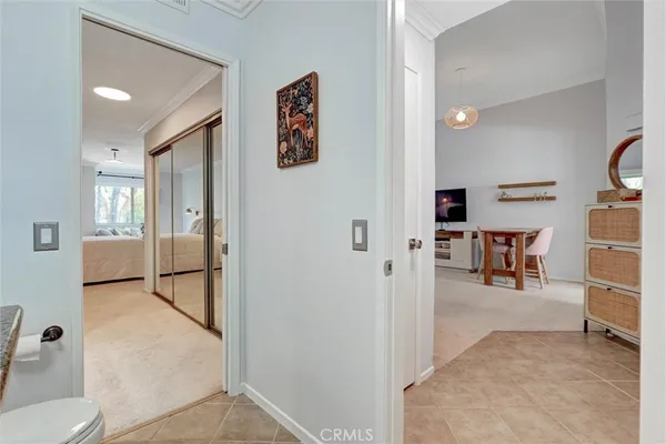 a view of a livingroom with furniture and front door