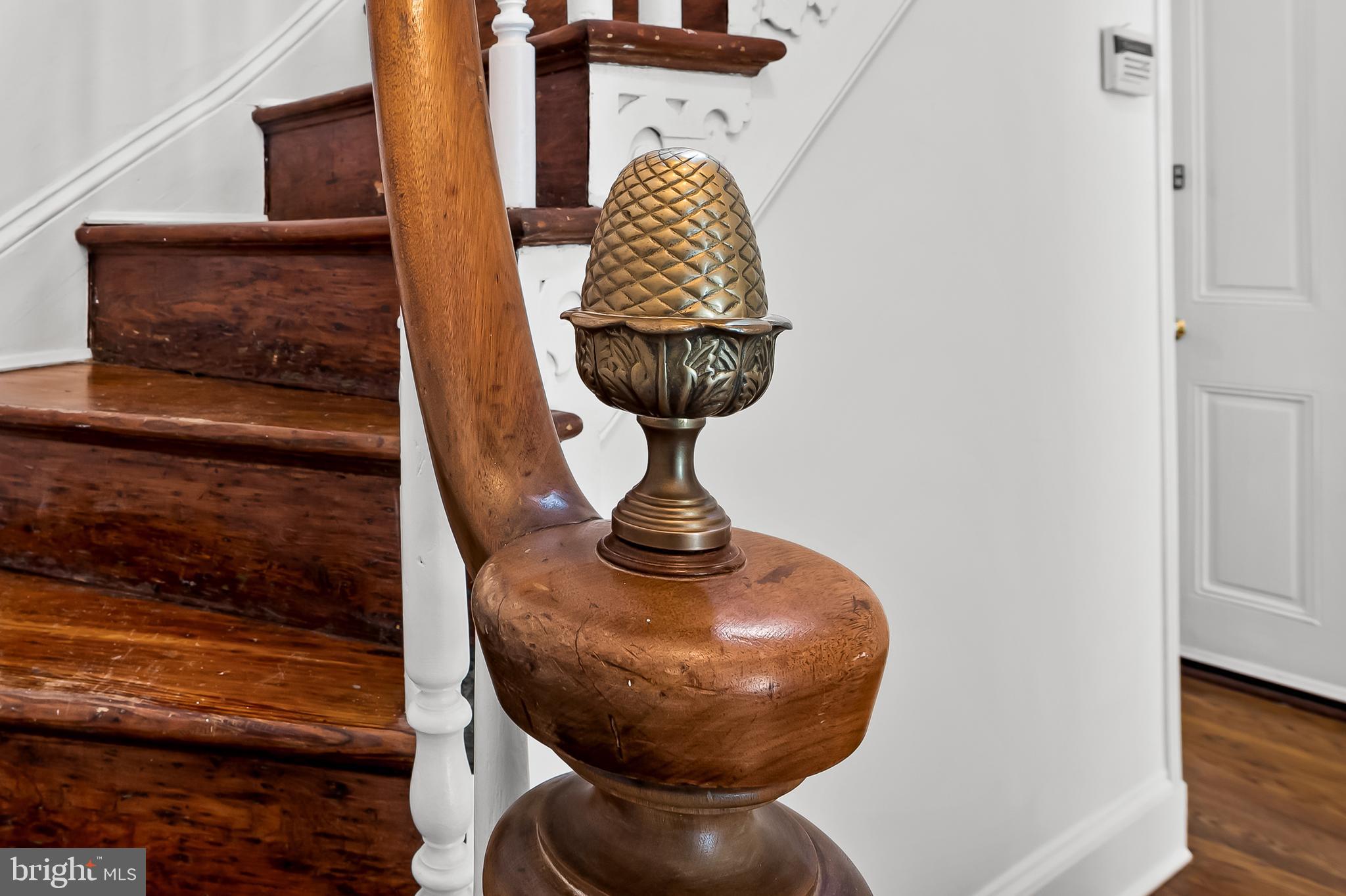 1431 Park Avenue Baltimore, MD 21217 - Photo 15 of 55 a room with a fireplace and potted plant