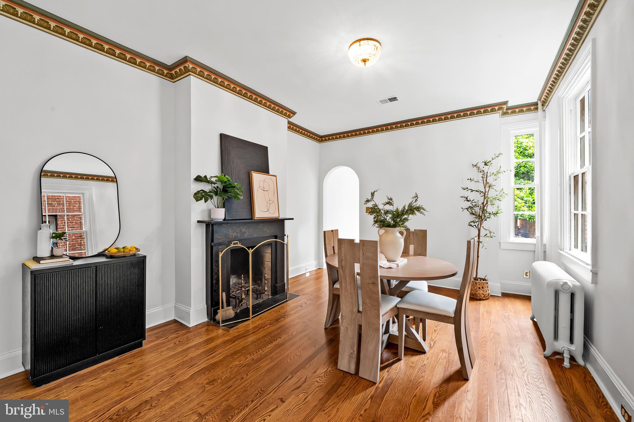 1431 Park Avenue Baltimore, MD 21217 - Photo 16 of 55 a view of a livingroom with furniture window and wooden floor