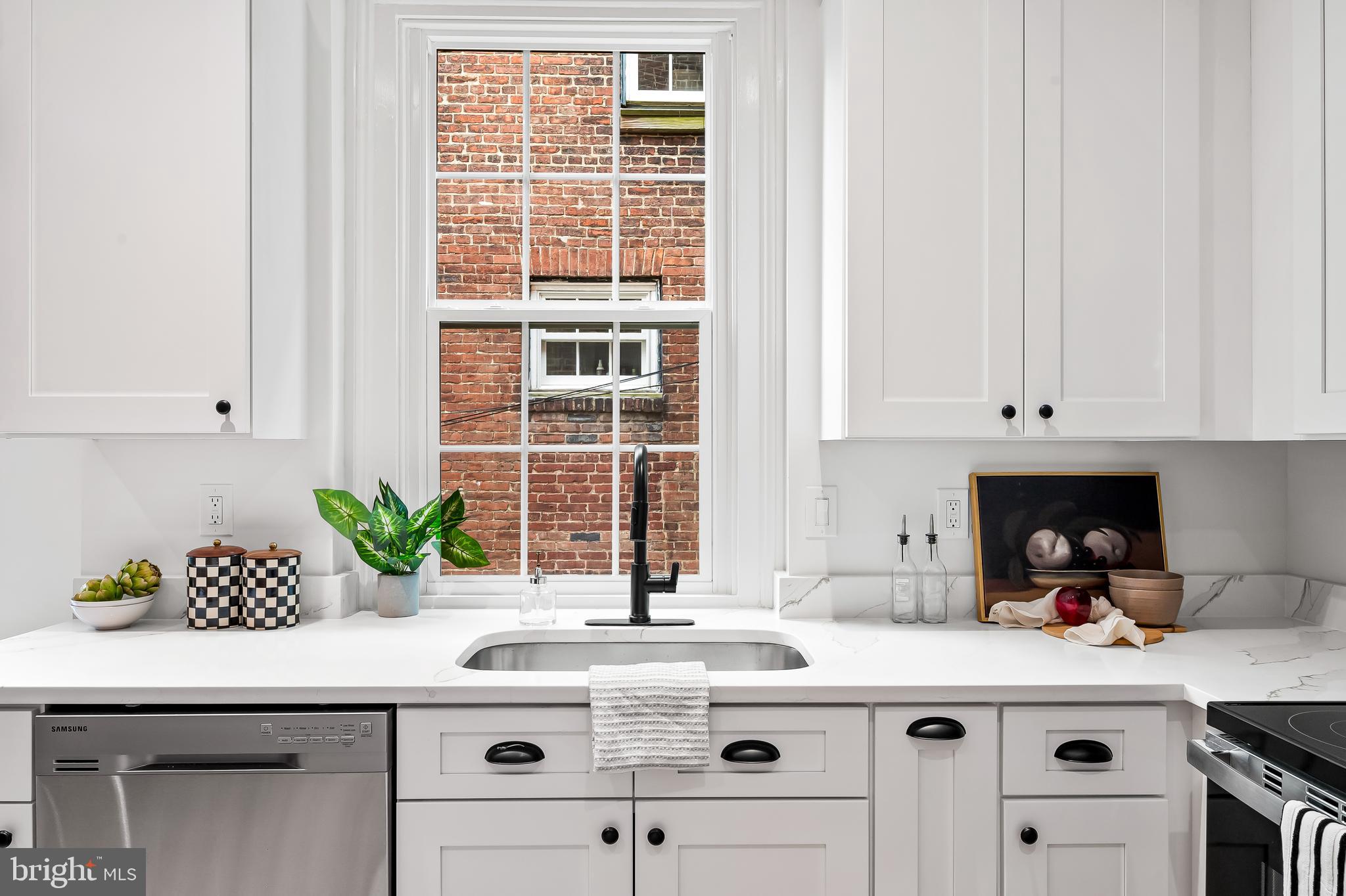 1431 Park Avenue Baltimore, MD 21217 - Photo 20 of 55 a kitchen with a sink and cabinets