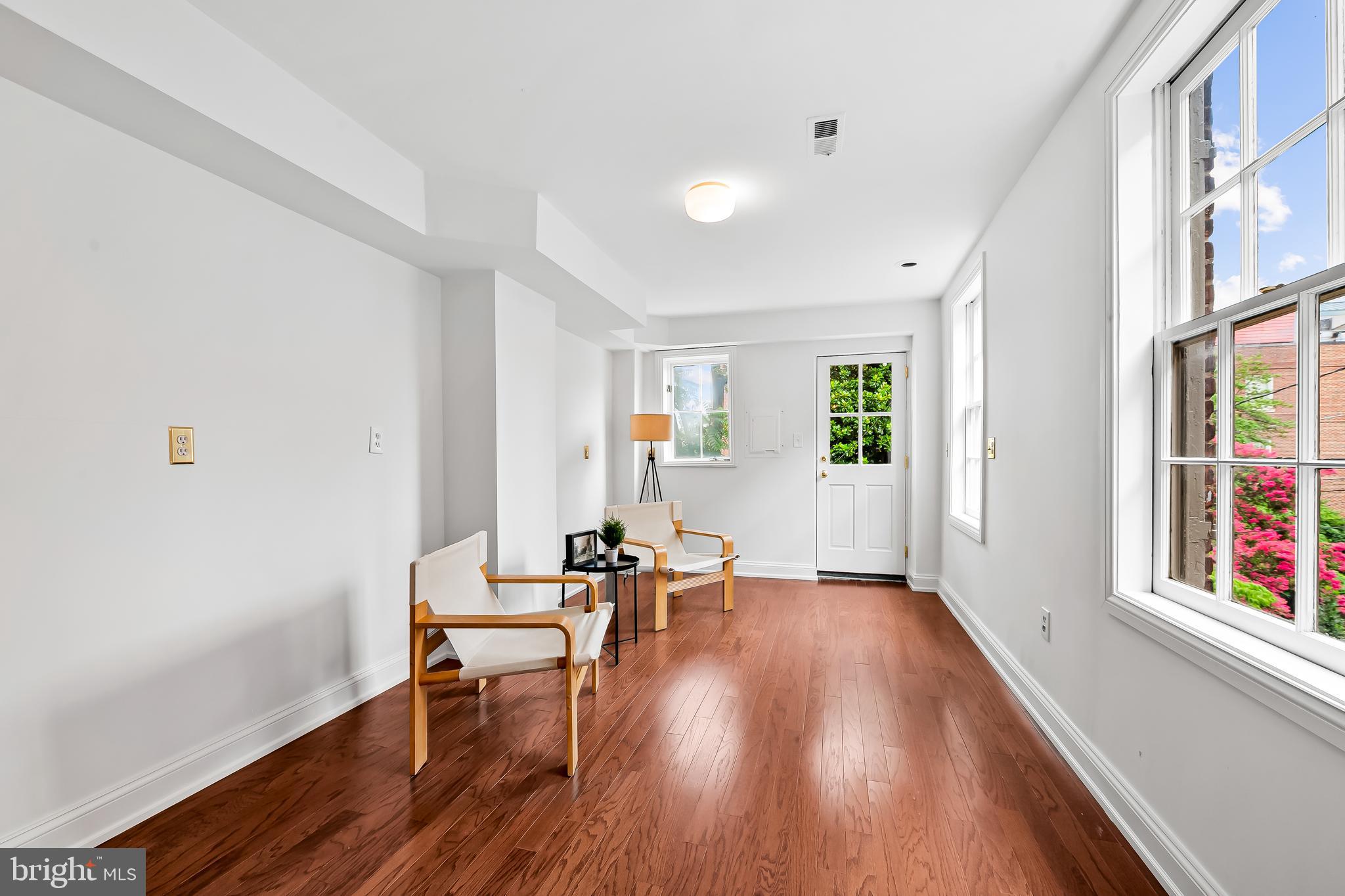 1431 Park Avenue Baltimore, MD 21217 - Photo 28 of 55 a view of a livingroom with wooden floor and furniture
