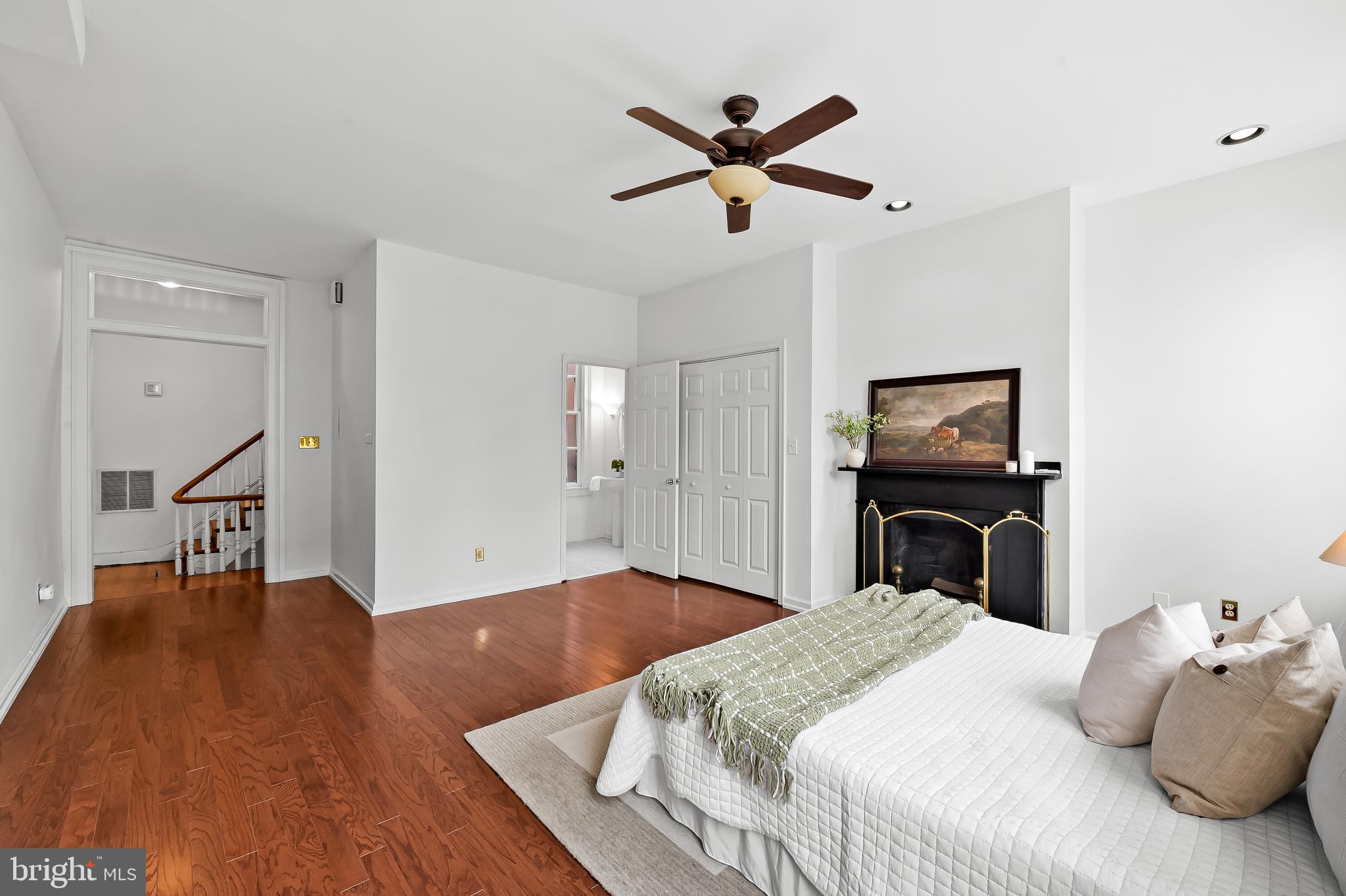 1431 Park Avenue Baltimore, MD 21217 - Photo 30 of 55 a bedroom with a bed and a tv on table