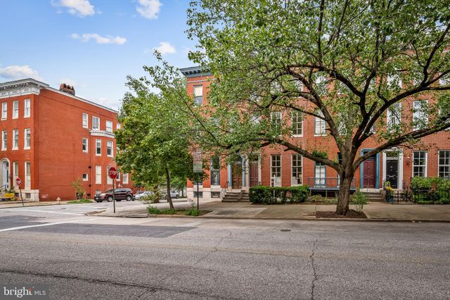a view of a building with a street