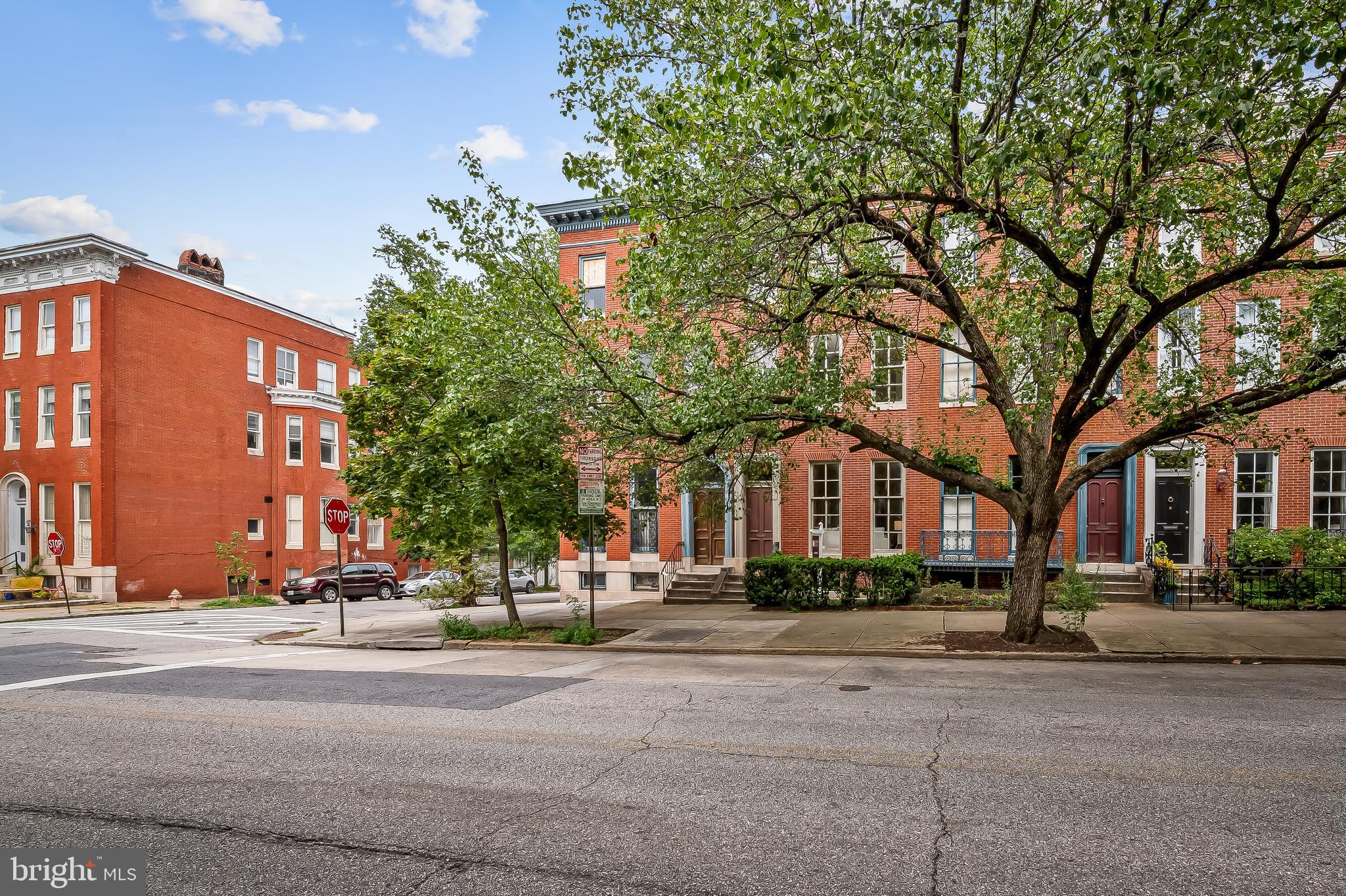 1431 Park Avenue Baltimore, MD 21217 - Photo 4 of 55 a view of a building with a street