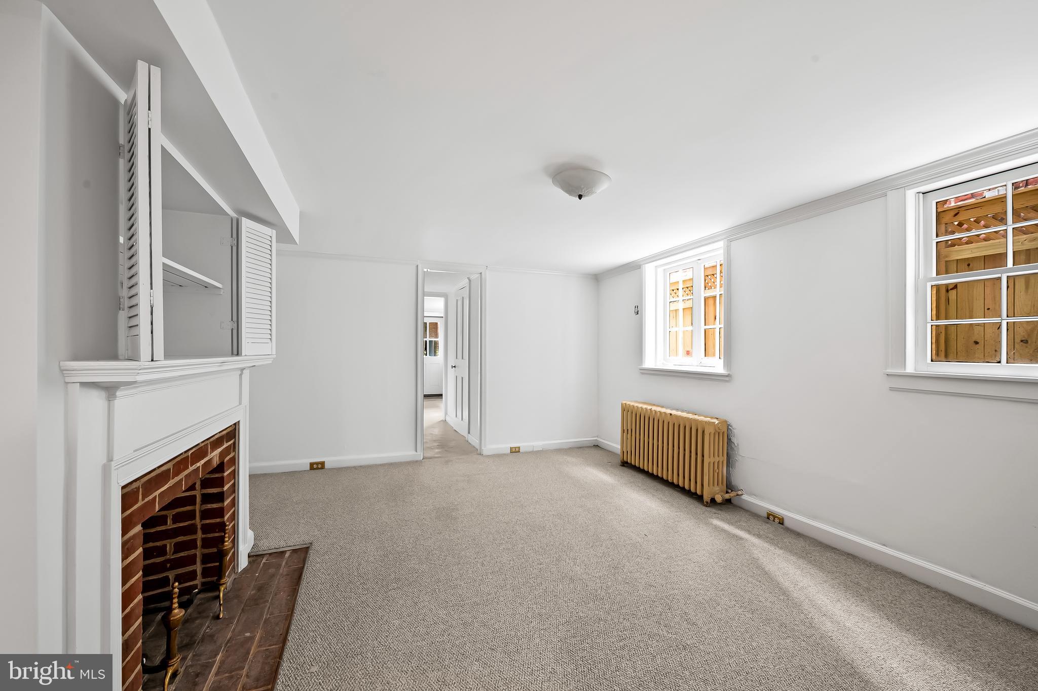 1431 Park Avenue Baltimore, MD 21217 - Photo 43 of 55 an empty room with windows