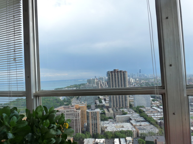 655 West Irving Park Road, Unit 4317 Chicago, IL 60613 - Photo 21 of 25 a view of a balcony with an ocean view
