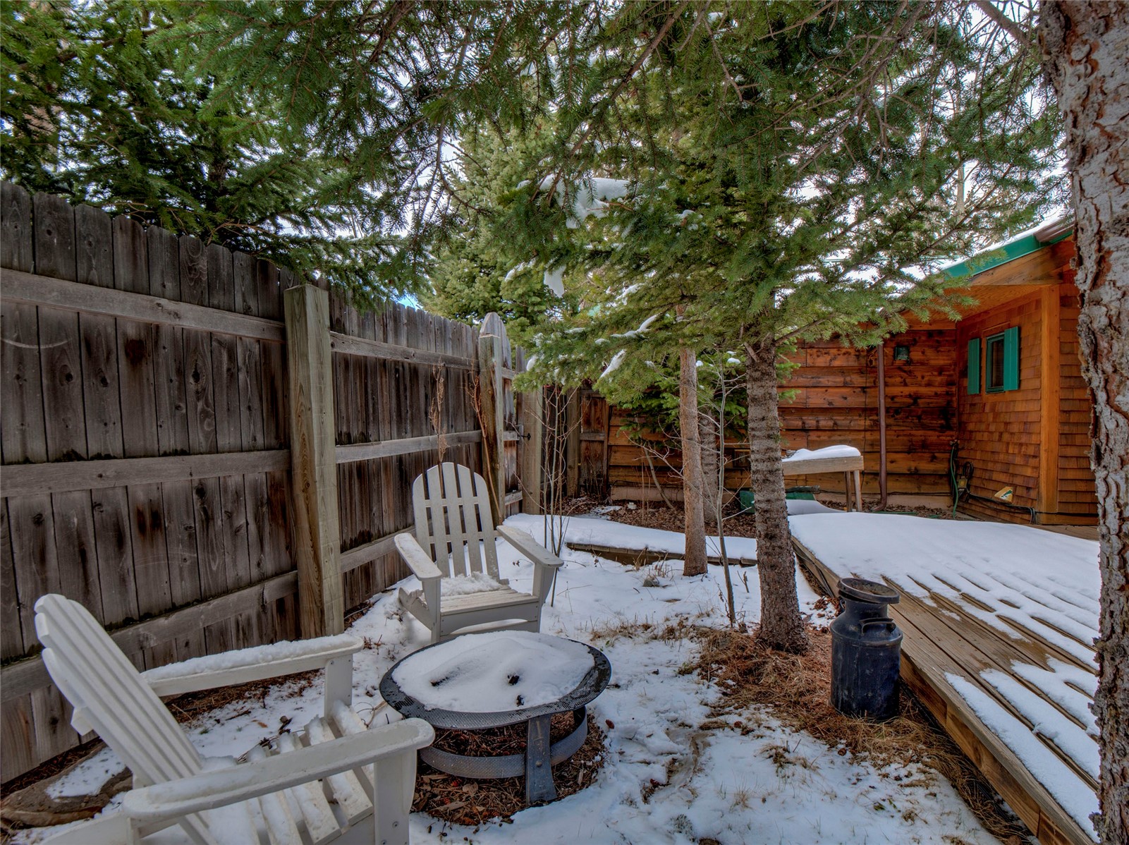 46 Singleton Road Alma, CO 80420 - Photo 49 of 50 a view of a chairs and table in the back yard of the house