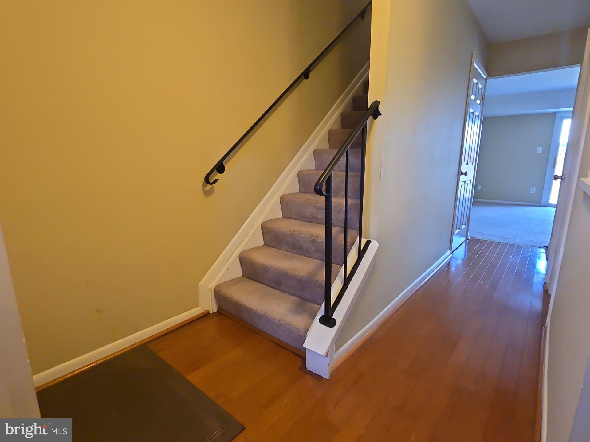 2115 Mager Drive Herndon, VA 20170 - Photo 3 of 41 a view of entryway with wooden floor