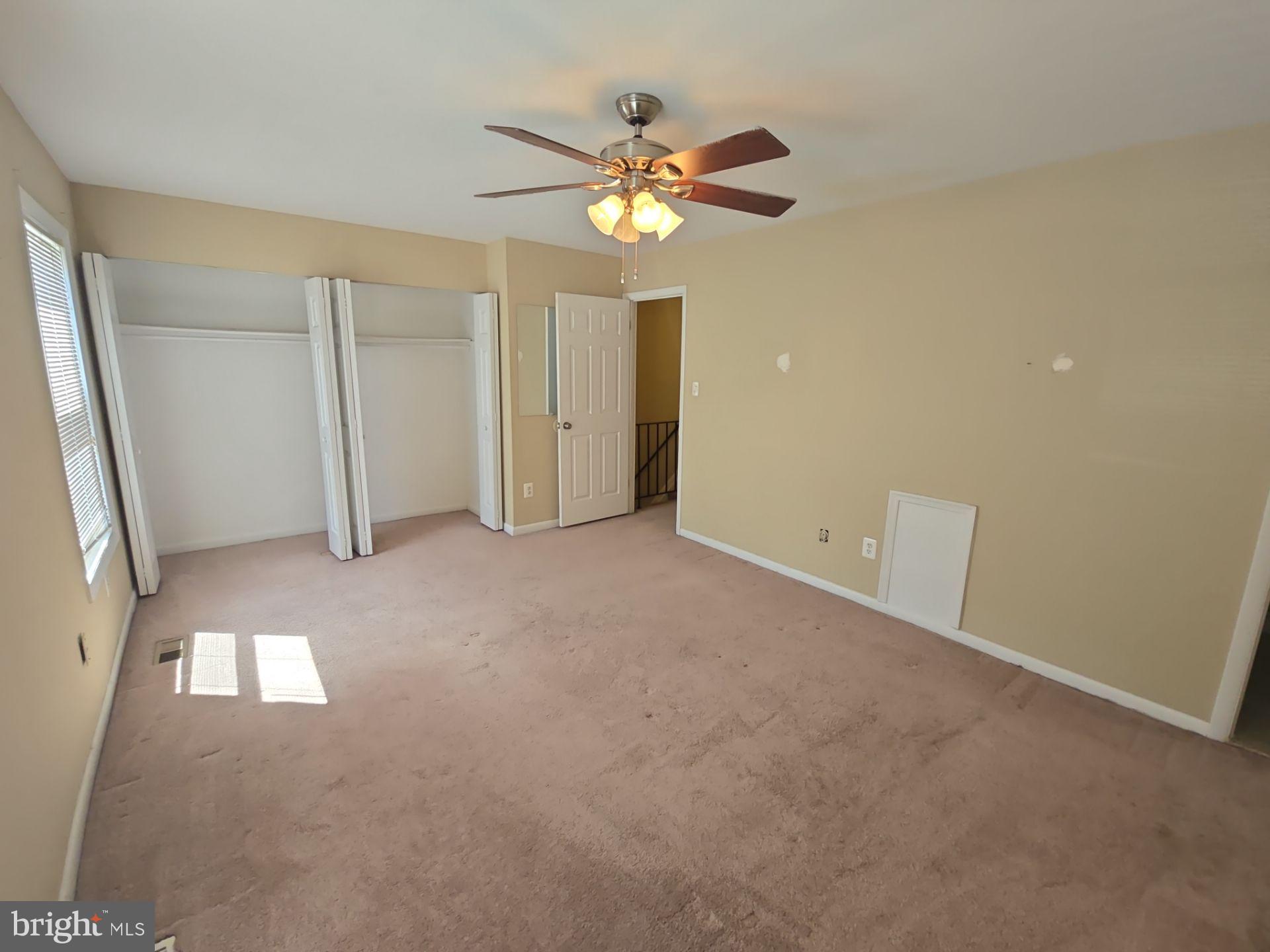 2115 Mager Drive Herndon, VA 20170 - Photo 32 of 41 an empty room with closet and windows