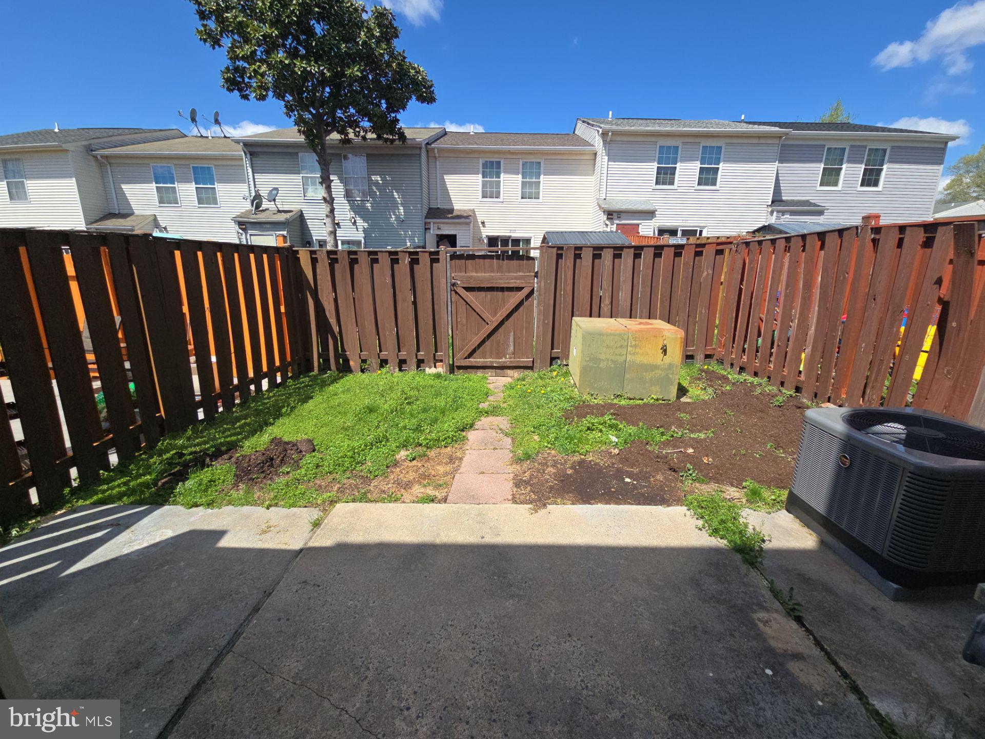 2115 Mager Drive Herndon, VA 20170 - Photo 41 of 41 a view of a dinning table and chairs in back yard of the house