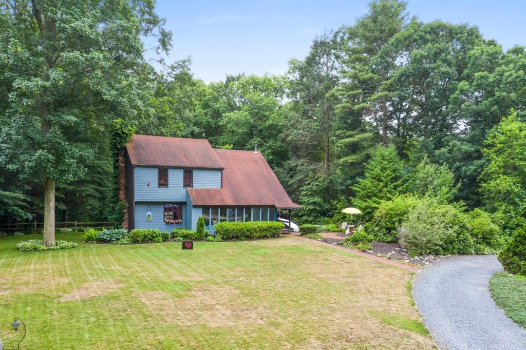 front view of a house with a yard