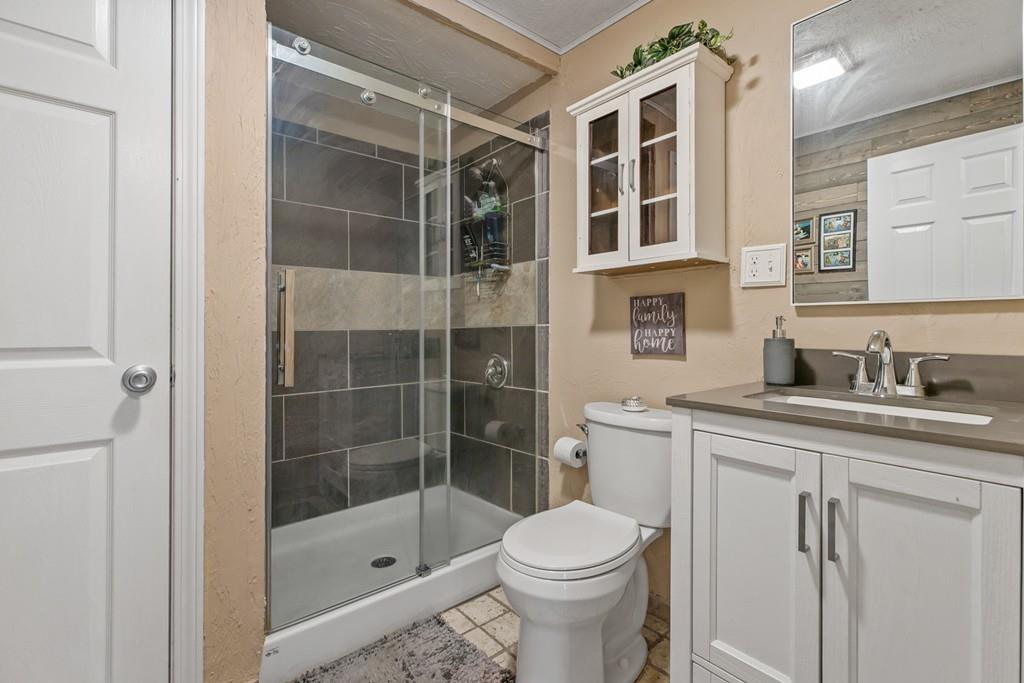 33 R F Higgins Drive Norwell, MA 02061 - Photo 21 of 34 a bathroom with a shower and a sink