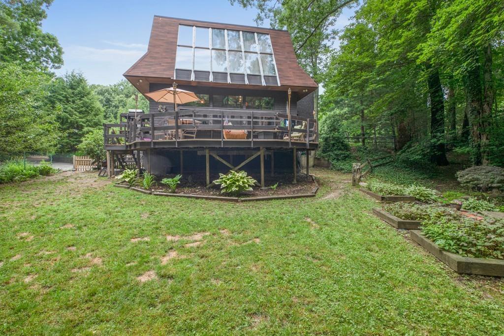 33 R F Higgins Drive Norwell, MA 02061 - Photo 26 of 34 a view of a house with a backyard