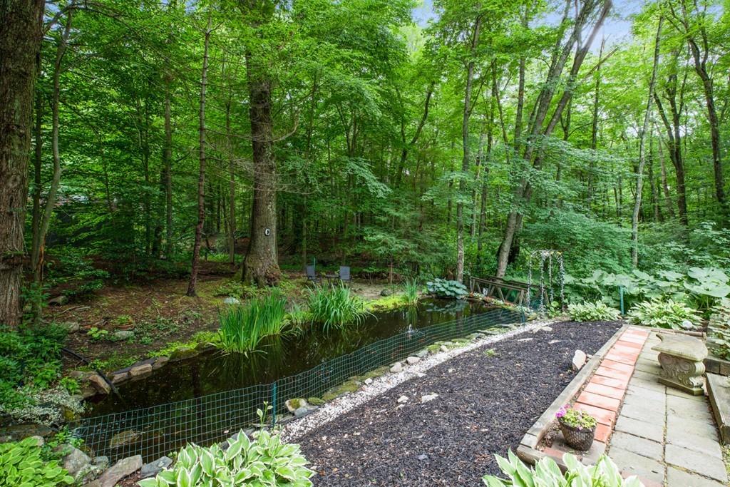 33 R F Higgins Drive Norwell, MA 02061 - Photo 30 of 34 a view of backyard with green space