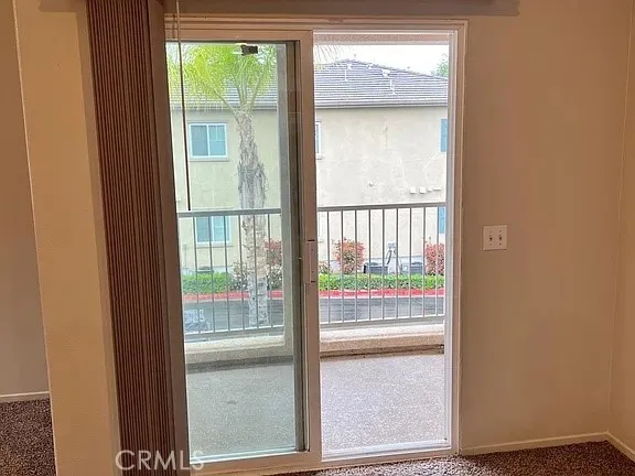 a view of a glass door with a door