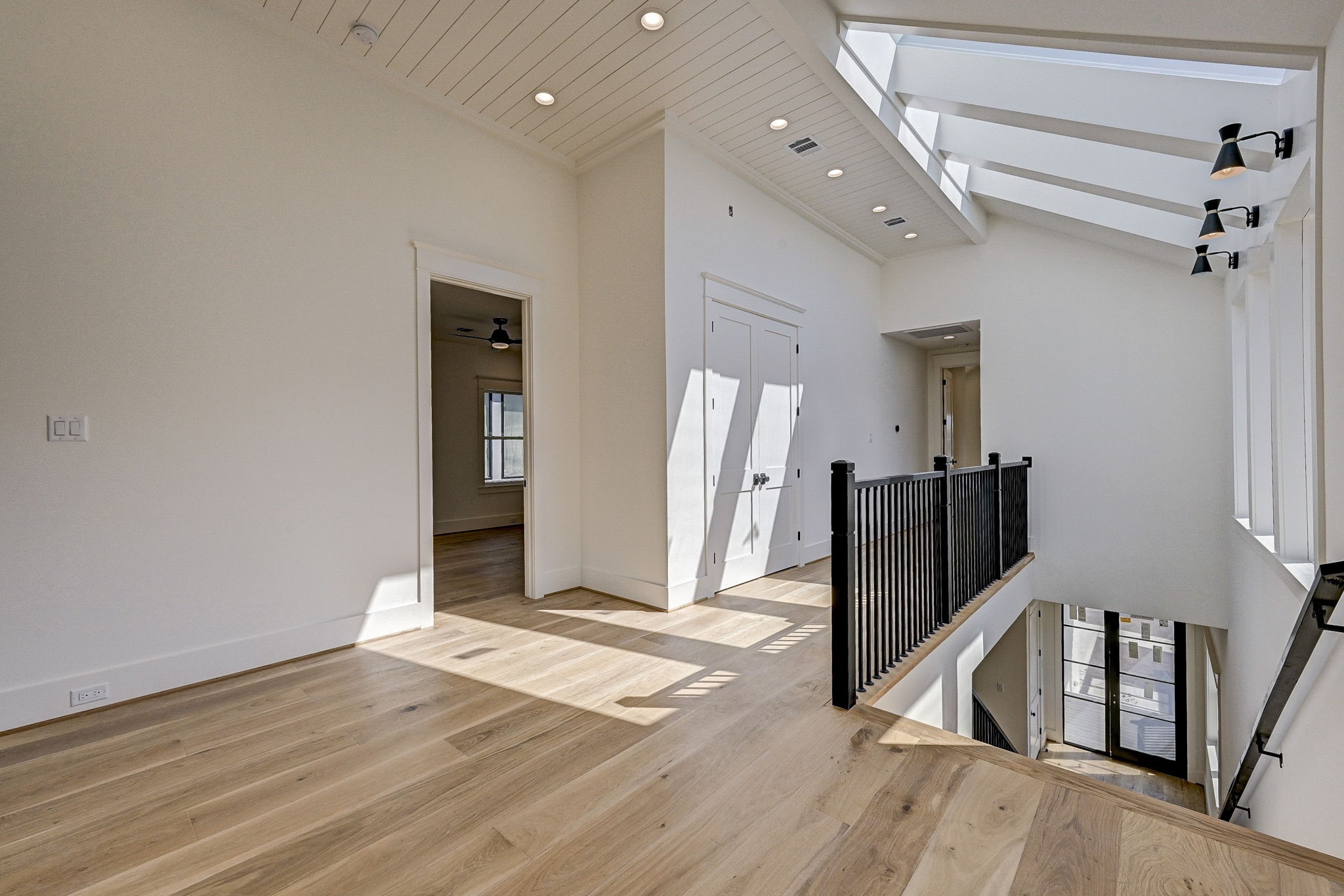 1315 Waverly Street Houston, TX 77008 - Photo 26 of 40 a view of a hallway with wooden floor and entryway
