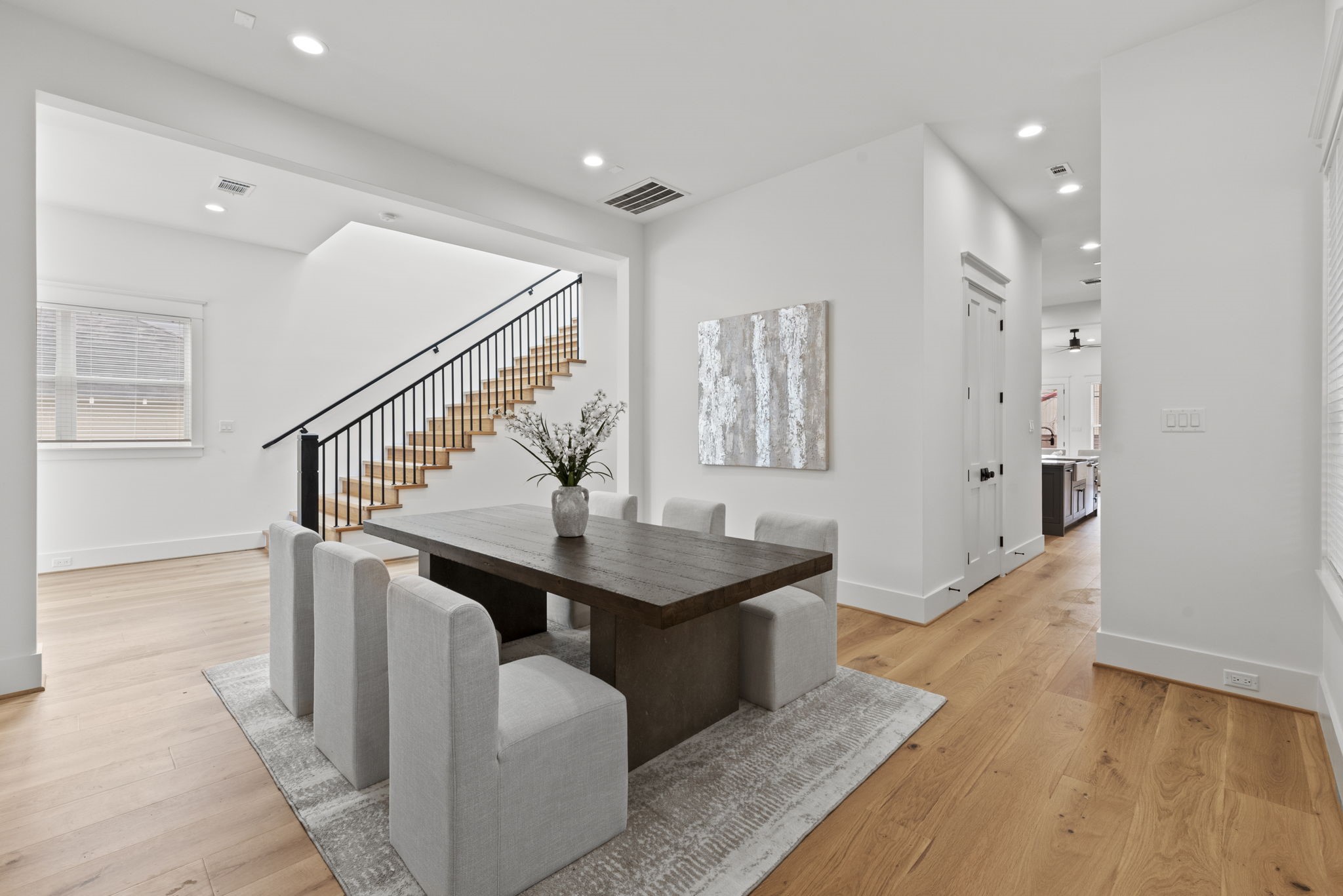 1315 Waverly Street Houston, TX 77008 - Photo 5 of 40 a view of entryway with wooden floor and stairs