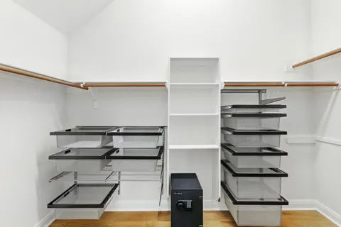 a bathroom with a shower and a sink