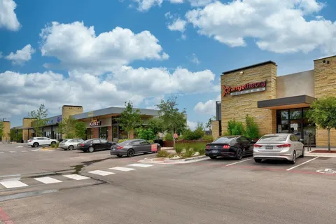 a building with trees in front of it