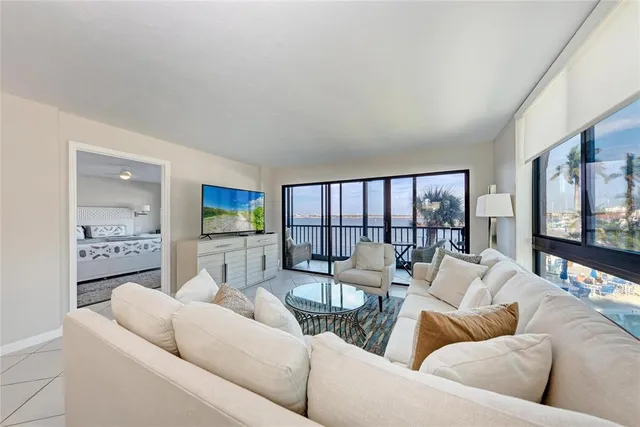 a kitchen with stainless steel appliances a sink a stove top oven a counter space and cabinets