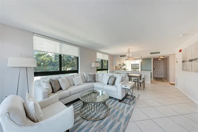a kitchen with a sink and a stove top oven
