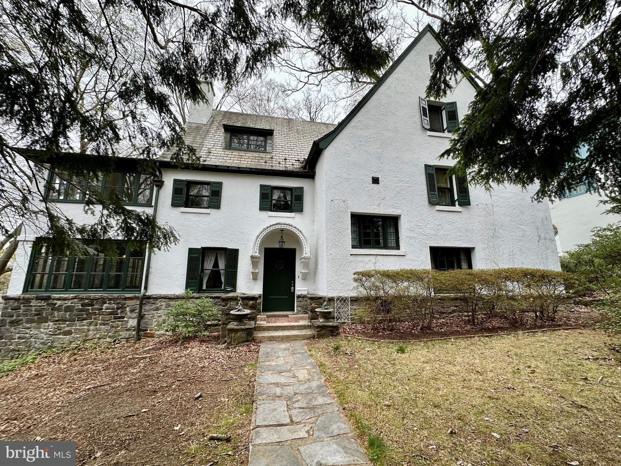 a front view of a house with garage