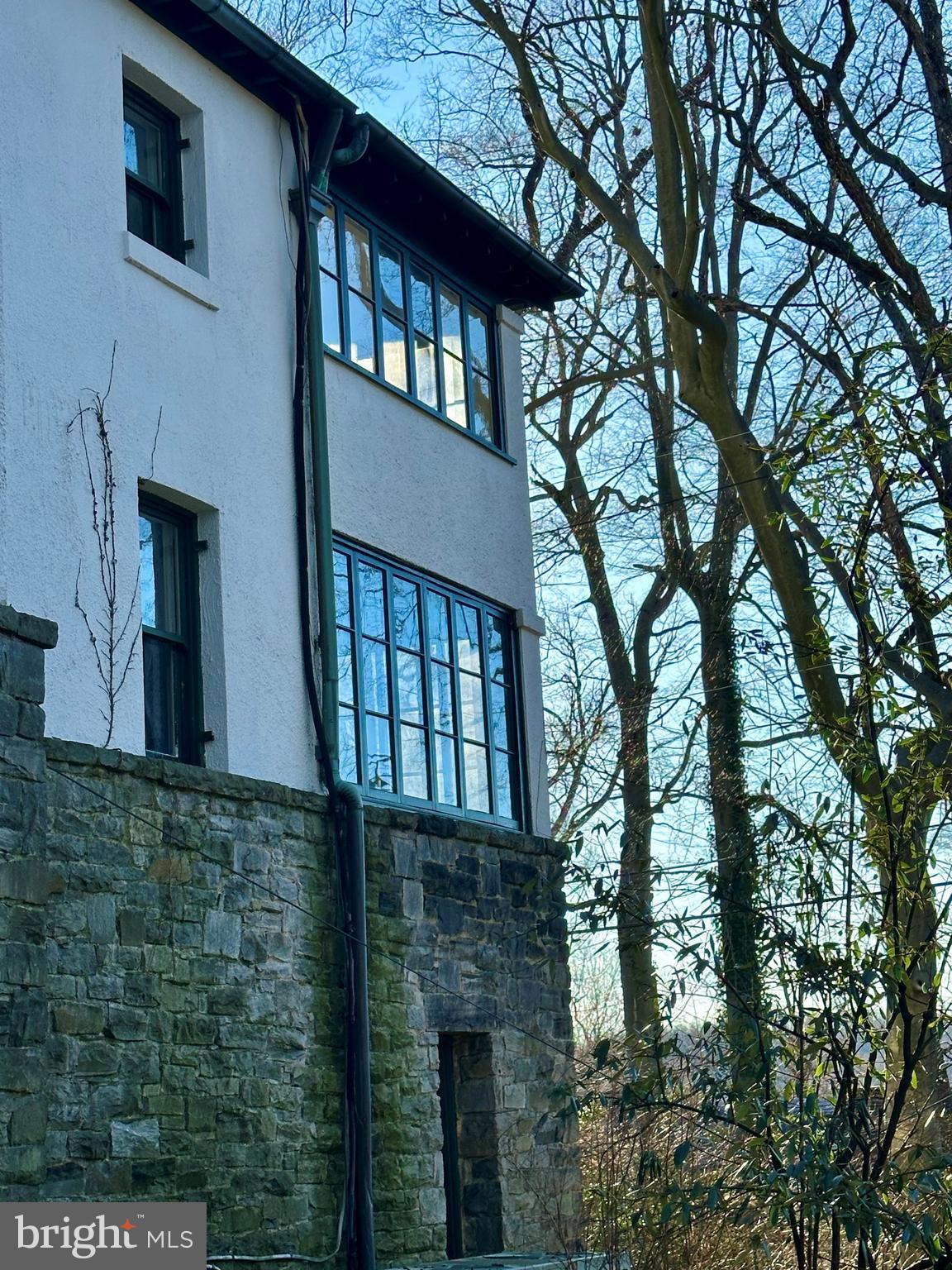 112 Elmhurst Road Baltimore, MD 21210 - Photo 13 of 29 a front view of a house with large tree