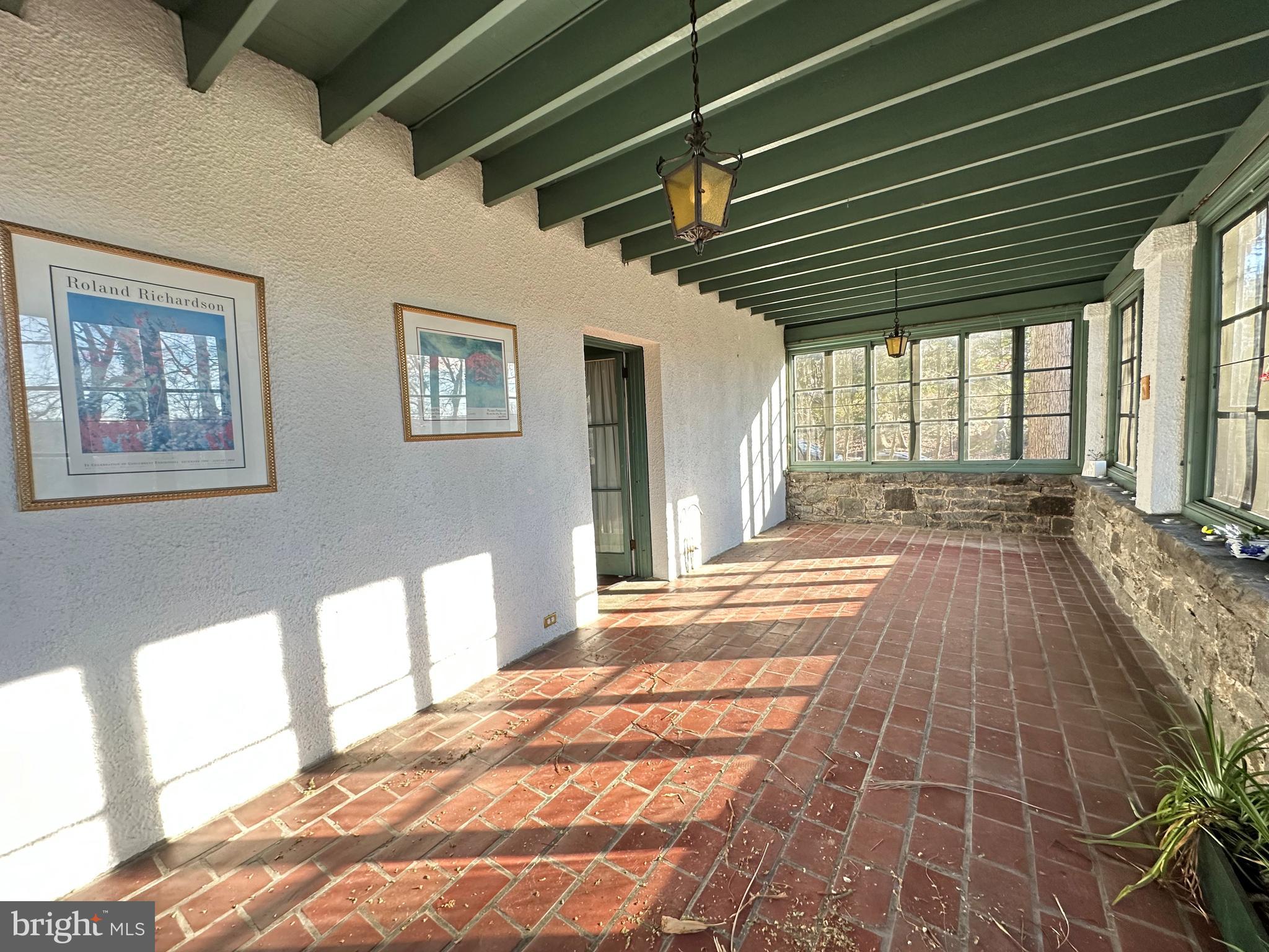 112 Elmhurst Road Baltimore, MD 21210 - Photo 5 of 29 a view of an empty room with a window