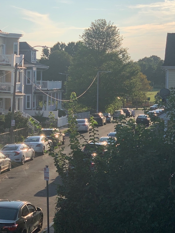 9 Kerwin Street, Unit 2 Boston, MA 02124 - Photo 13 of 13 a view of a street with of cars parked