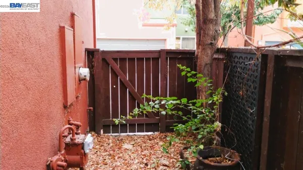 a view of a building with a yard