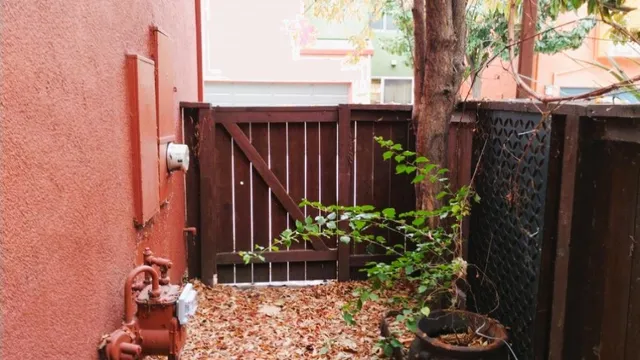 a view of a building with a yard