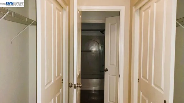 a bathroom with a shower and a sink