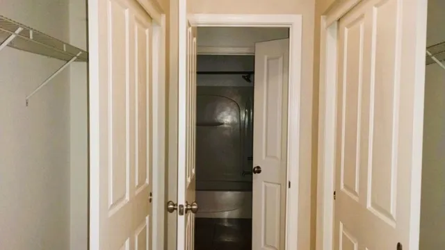 a bathroom with a shower and a sink